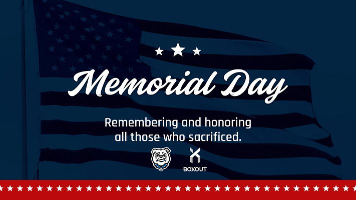 Memorial Day template with a dark blue background featuring an American flag. Central bold text reads 'Memorial Day' with a subtitle honoring sacrifices. Red border with white stars below.