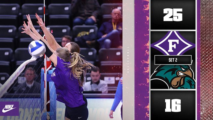 Volleyball score template with fiery purple and teal design. Left side features action photo of player spiking ball, right side displays score sections with team logo, set number, and final scores on dark background with flame-themed border accent.