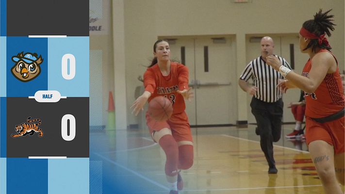 Score update template in landscape layout featuring an athlete holding a basketball, score areas on the left, team names, and branding elements in a dark and vibrant color palette.