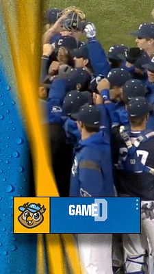 Vertical motion template for Instagram stories featuring team celebration photo with animated wave effects, yellow and blue color scheme, team logo on left, and 'GAME DAY' text banner at bottom